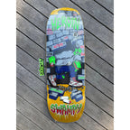 Heroin 'Swampy Stomp' skateboard deck with neon green 'HEROIN SWAMPY' written on it and hoodie crocodile lurking in the graffiti subway. 