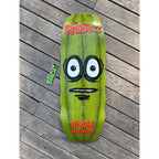 Heroin skateboard deck 'THE PICKLE 2' in orange written on giant green pickle graphic with large, white eyes. 'HEROIN Skateboards' branding in orange.