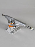 A single skateboard truck with a silver chrome metal body, featuring an orange accent ring and a silver mounting base, photographed on a neutral gray background.