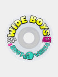 A single skateboard wheel from Wide Boys Snout Wheels, featuring a white outer barrel with bold yellow 'WIDE BOYS' text, teal 'SNOUT' lettering, pink 'WHEELS' text, and a small green cartoon character. The wheel also shows '55mm' and 'BT2 Formula' markings.