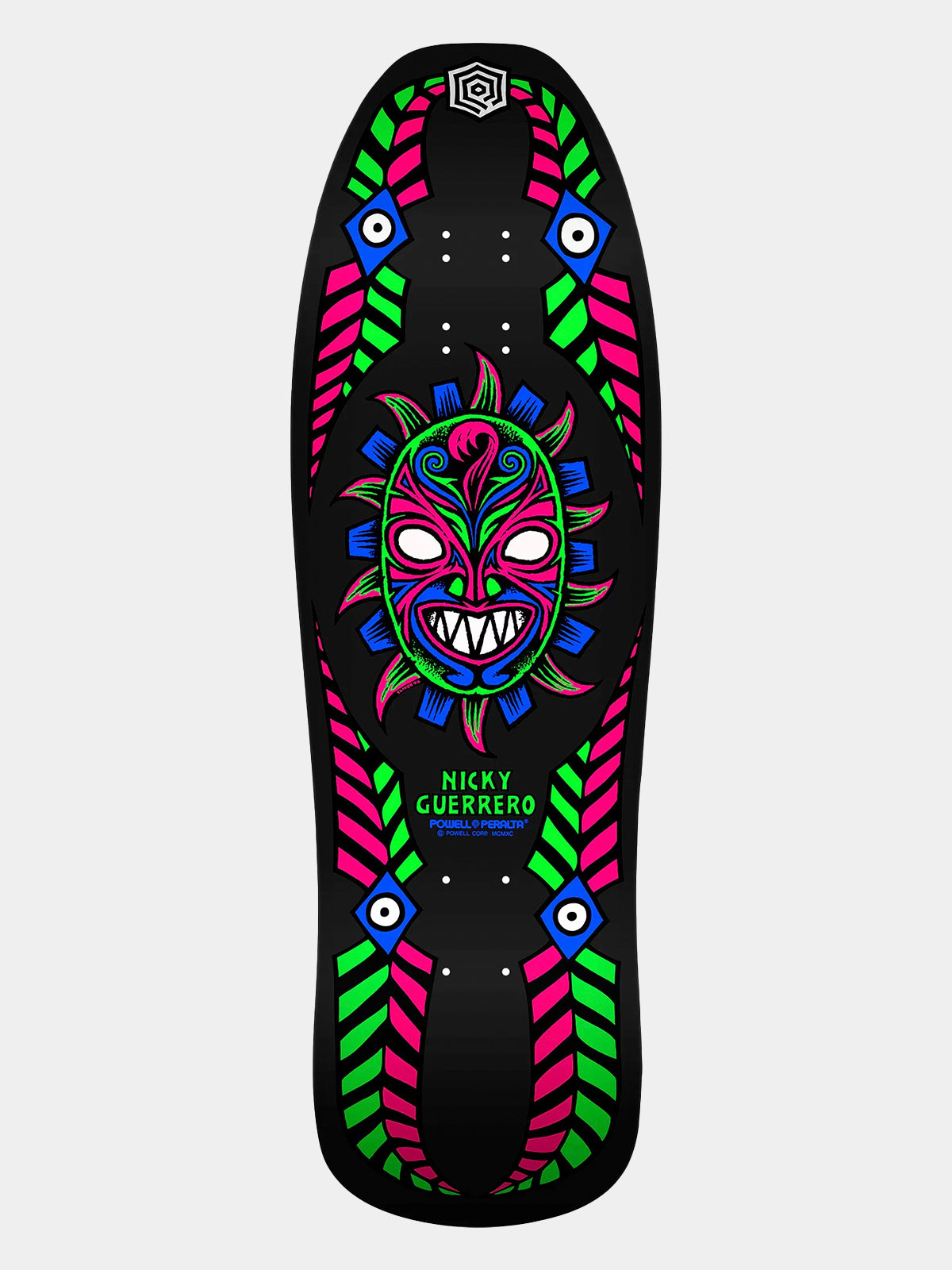 Powell Peralta Nicky Guerrero Mask Backlight Skateboard Deck Reissue. Bottom graphic shows Sean Cliver tribal mask artwork in neon fluorescent ink on an asymmetrical 10 inch 1989 shape. 'NICKY GUERRERO' branding in neon green.