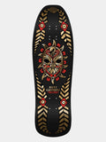 A Nicky Guerrero full-size skateboard deck featuring a black background with a central red and gold tribal mask graphic, surrounded by gold geometric patterns and red accents.
