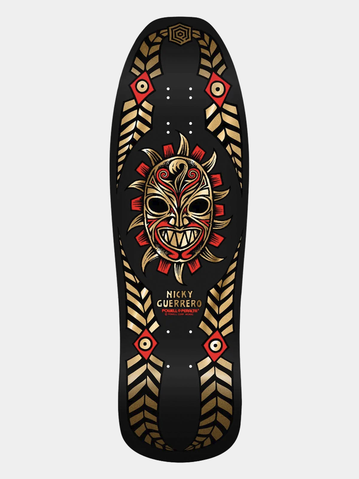 A Nicky Guerrero full-size skateboard deck featuring a black background with a central red and gold tribal mask graphic, surrounded by gold geometric patterns and red accents.
