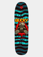 Powell Peralta Pro Bucky Lasek tortoise FLIGHT Skateboard Deck with a vibrant, detailed illustration of an aggressive-looking cartoon tortoise skeleton bursting forward, mimicking the classic Powell 'Ripper' style, set against a metallic turquoise foil background. 