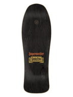 A black skateboard deck with a Jagermeister x Santa Cruz collaboration logo in red and gold on the underside, shown against a plain white background.