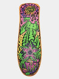A skateboard deck featuring a highly detailed, colorful psychedelic graphic of a green monster with sharp teeth, set against a pink and purple background with yellow flames, shown on a light gray background.